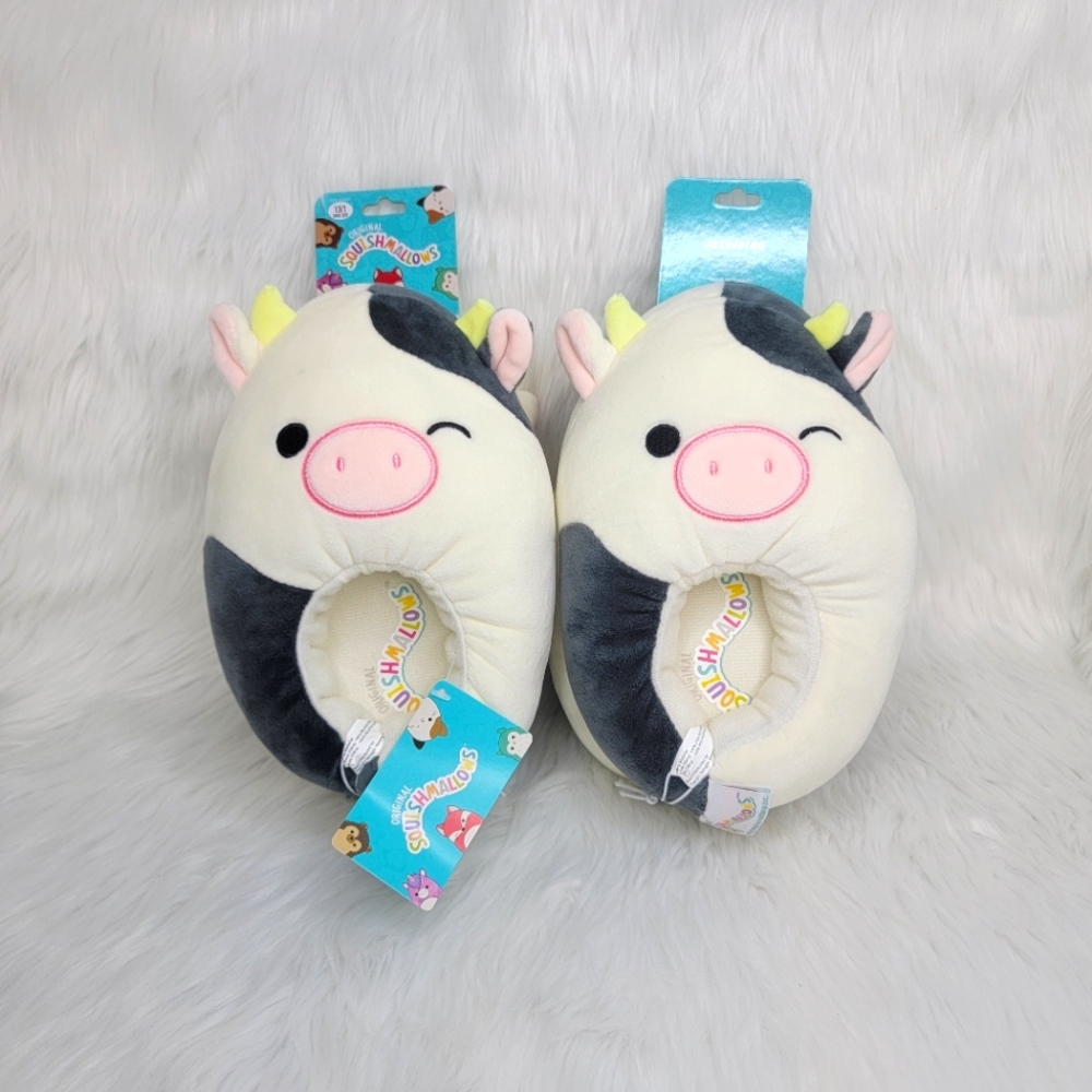 Squishmallows Connor the cow plush slippers.